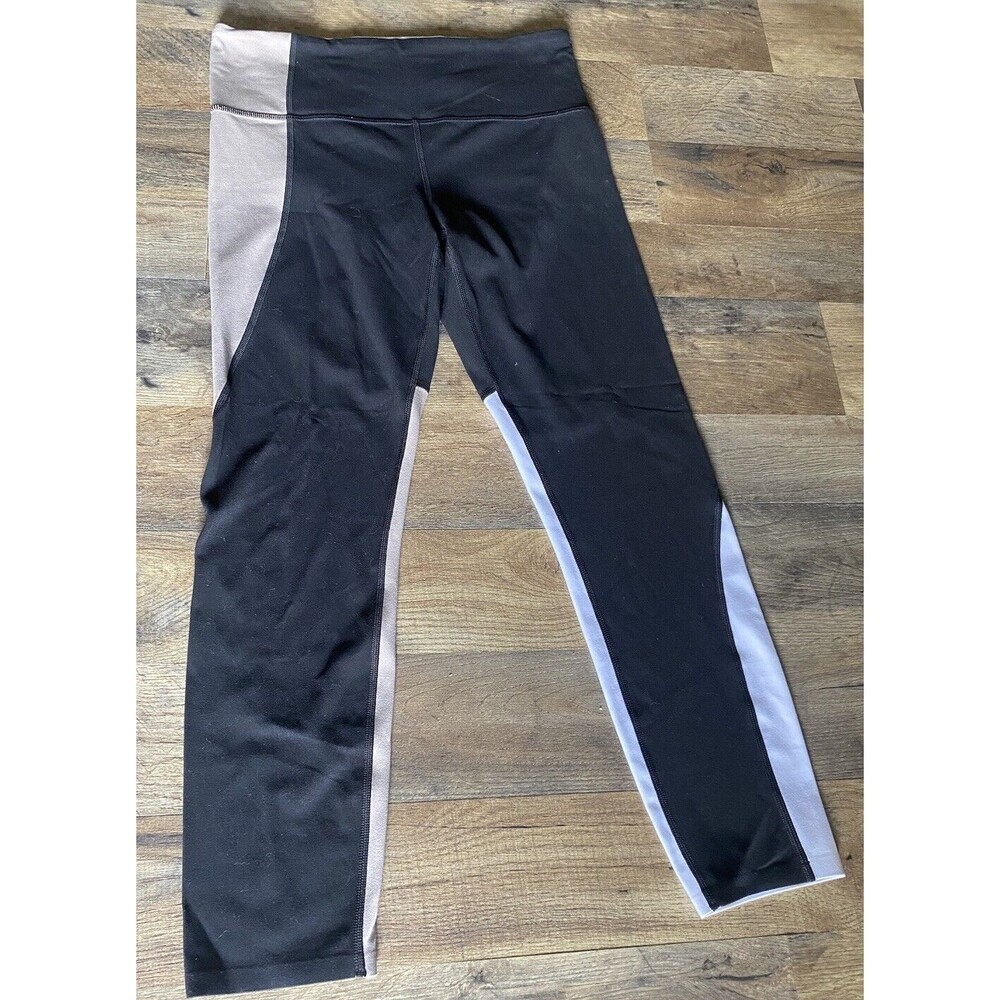Athleta‎ Elation Asym 7/8 Tight Black Tan and White Leggings Size Medium